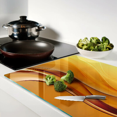Glass cutting board Waves in shades of gold