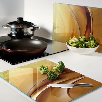 Glass cutting board Waves in shades of gold