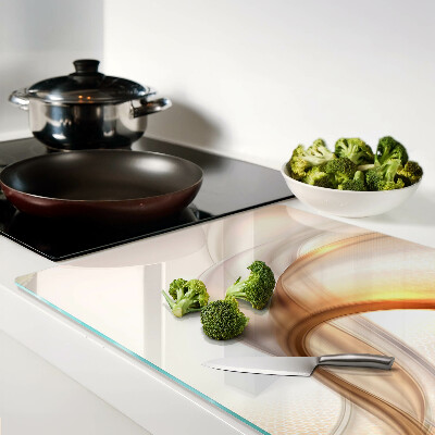 Glass cutting board Light waves in shades of gold