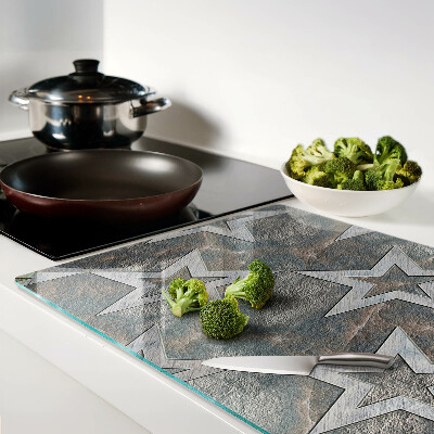 Chopping board glass Stars on texture background