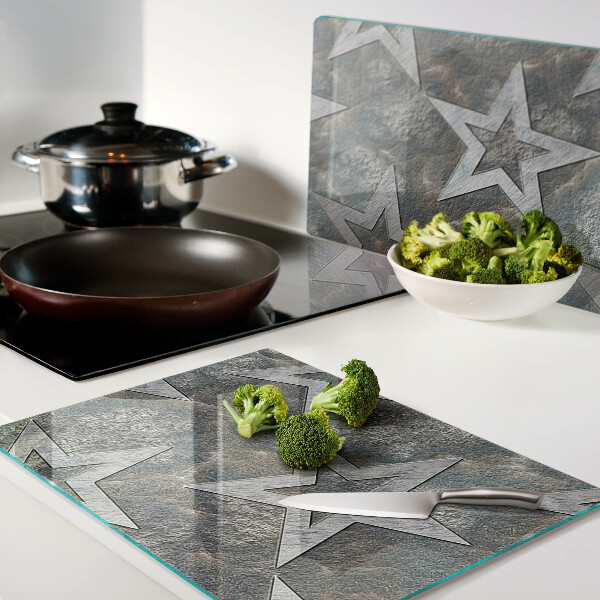 Chopping board glass Stars on texture background