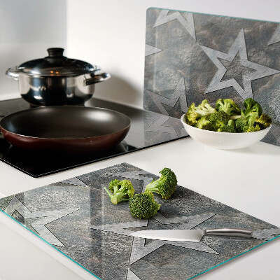 Chopping board glass Stars on texture background