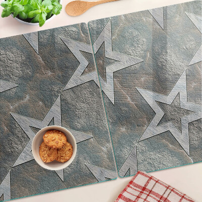 Chopping board glass Stars on texture background