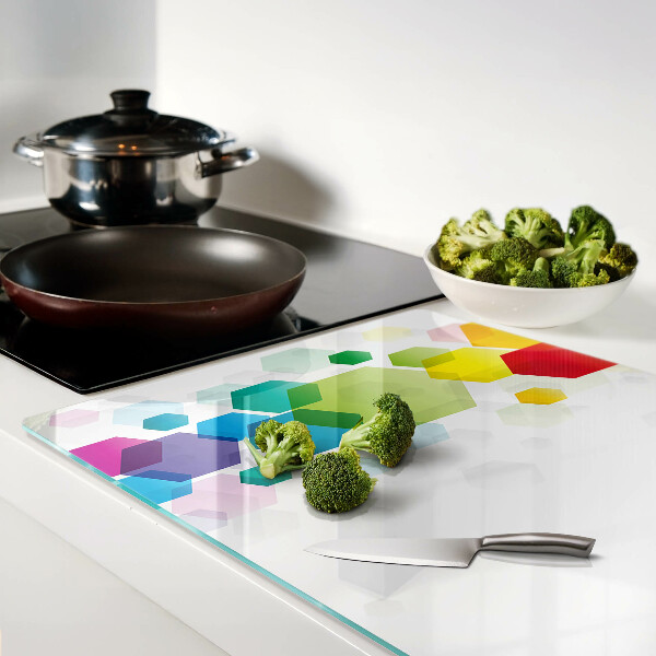 Glass cutting board Colorful hexagons on the background