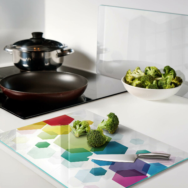 Glass cutting board Colorful hexagons on the background