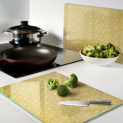 Glass chopping board Flower of life on a yellow background