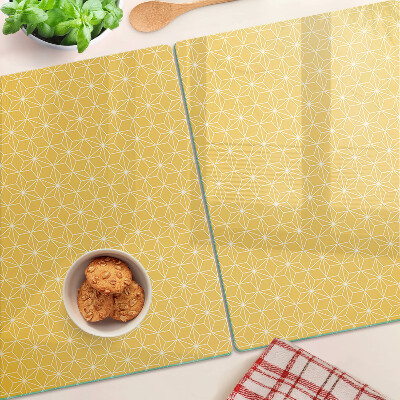 Glass chopping board Flower of life on a yellow background