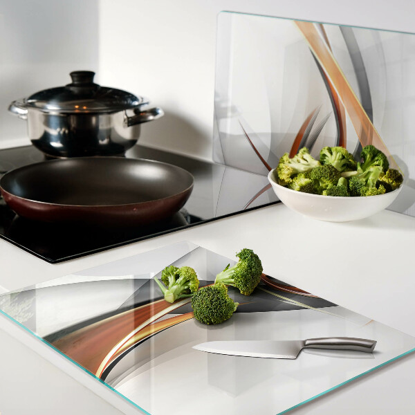 Glass chopping board Abstract waves in shades of gold