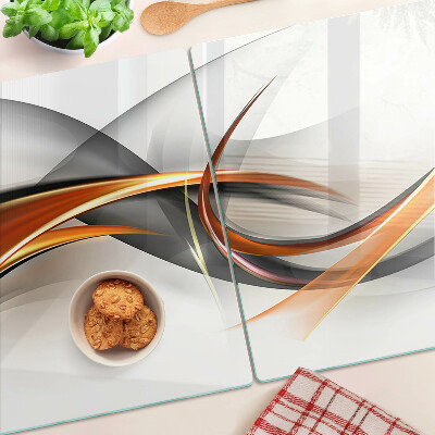 Glass chopping board Abstract waves in shades of gold