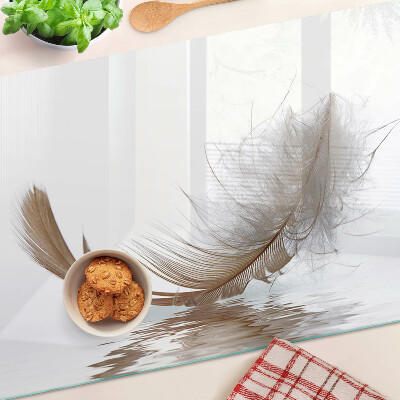 Chopping board A feather against the water