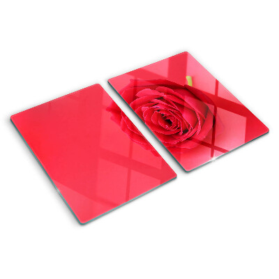 Cutting board Red rose on the background