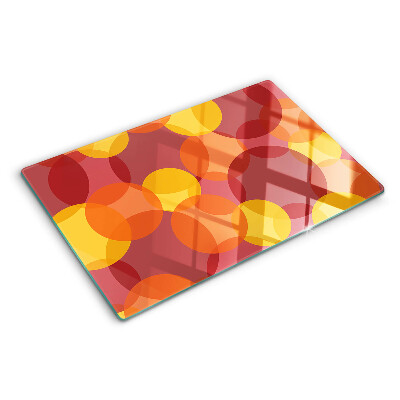 Glass chopping board Colorful circles in warm tones