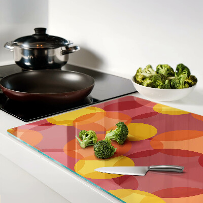 Glass chopping board Colorful circles in warm tones