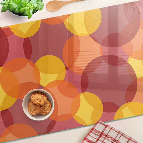 Glass chopping board Colorful circles in warm tones