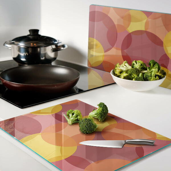 Glass chopping board Colorful circles in warm tones