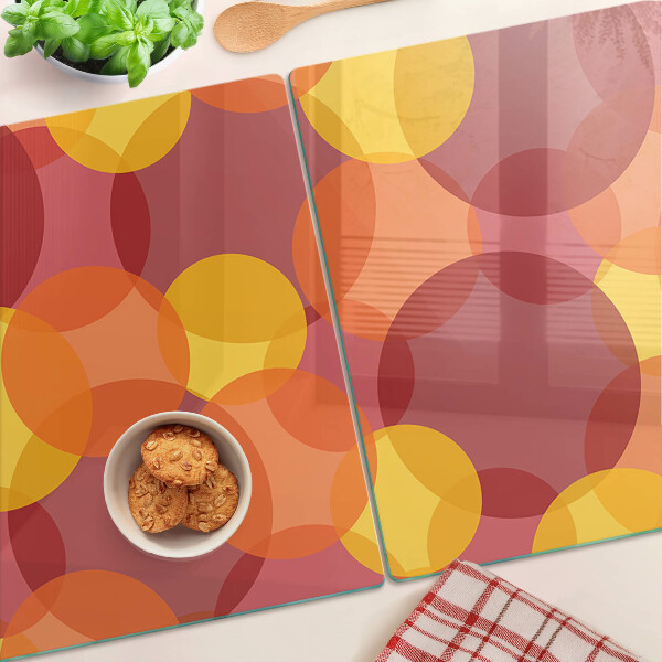 Glass chopping board Colorful circles in warm tones