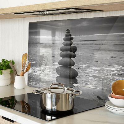 Glass cutting board Beach stones in black and white