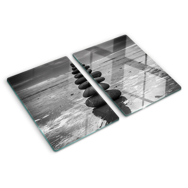 Glass cutting board Beach stones in black and white