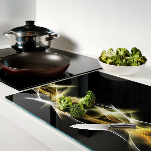 Glass cutting board A wave of light in shades of gold