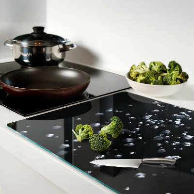 Glass kitchen board Crystal bubbles on a black background