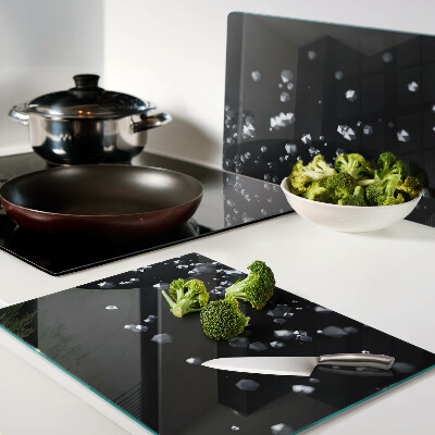 Glass kitchen board Crystal bubbles on a black background