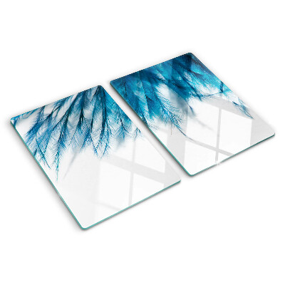 Glass chopping board Blue feathers on a white background