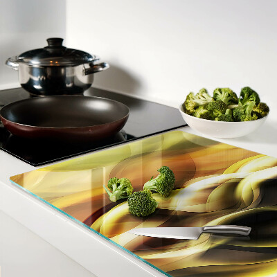 Glass chopping board Abstract waves in shades of gold