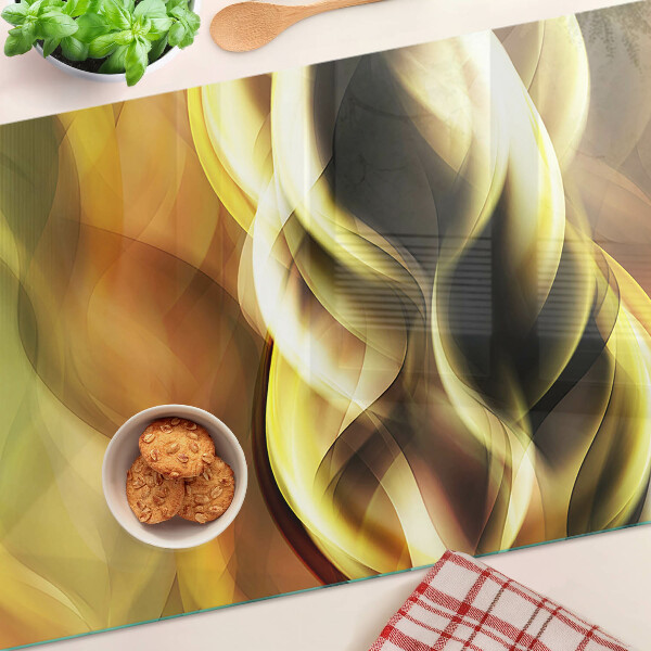 Glass chopping board Abstract waves in shades of gold