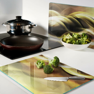 Glass chopping board Abstract waves in shades of gold