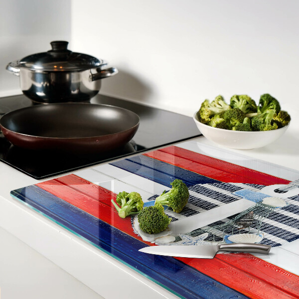 Glass cutting board Anchor against the background of stripes