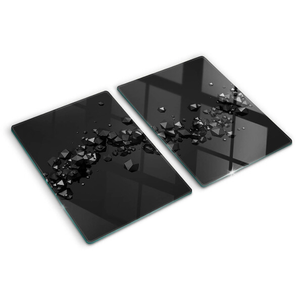 Glass chopping board Black crystals on the background