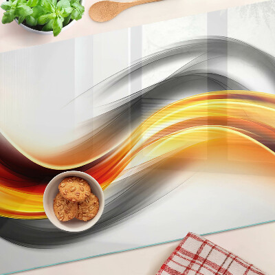 Chopping board glass Waves in orange and black