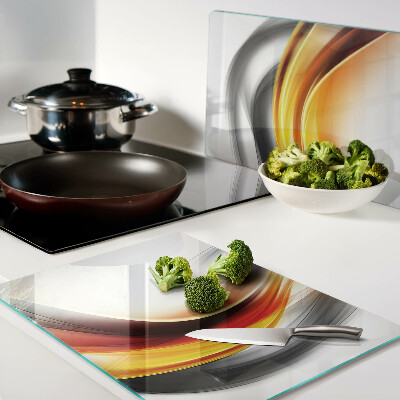 Chopping board glass Waves in orange and black