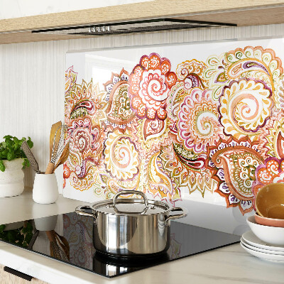 Chopping board glass Paisley motif in shades of red and gold