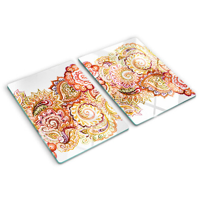 Chopping board glass Paisley motif in shades of red and gold