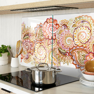 Chopping board glass Paisley motif in shades of red and gold
