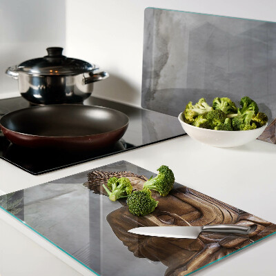 Chopping board Buddha in meditation