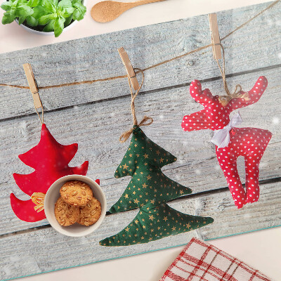 Cutting board Christmas decorations on a wooden background