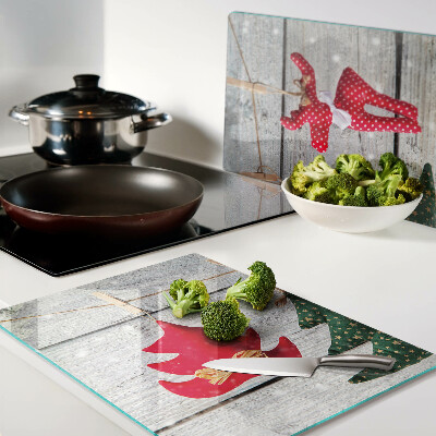 Cutting board Christmas decorations on a wooden background