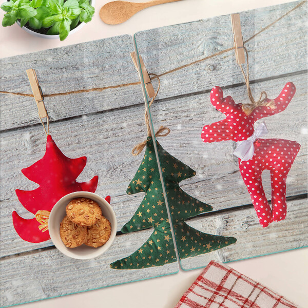 Cutting board Christmas decorations on a wooden background