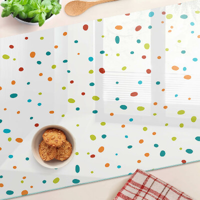 Chopping board glass Colorful dots on a white background