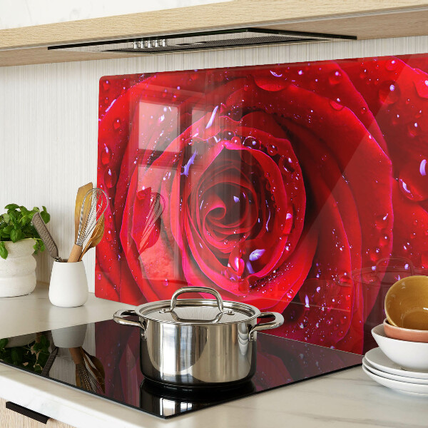 Glass kitchen board Red rose with water drops