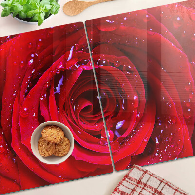 Glass kitchen board Red rose with water drops