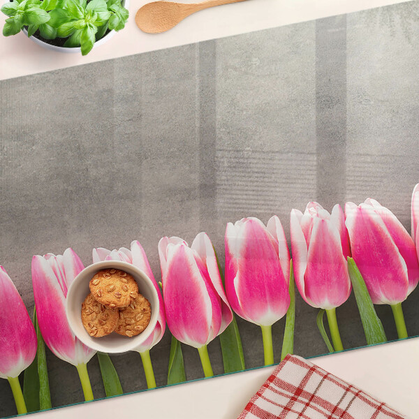 Cutting board Tulips on a gray background
