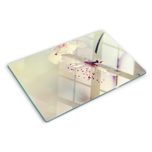 Glass kitchen board Flowers on a geometric background
