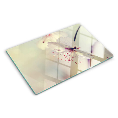 Glass kitchen board Flowers on a geometric background