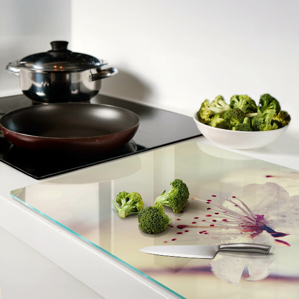 Glass kitchen board Flowers on a geometric background