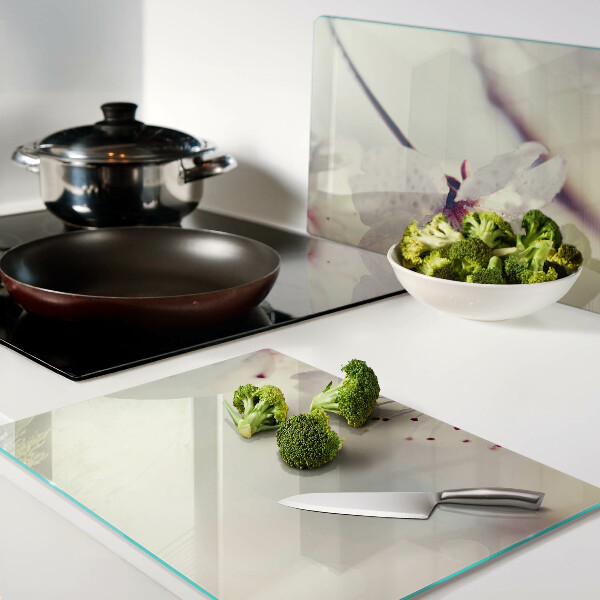 Glass kitchen board Flowers on a geometric background