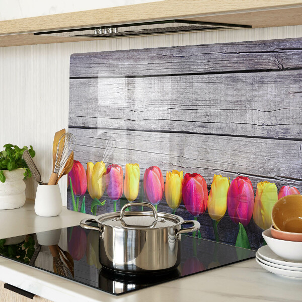 Chopping board Tulips on a wooden background