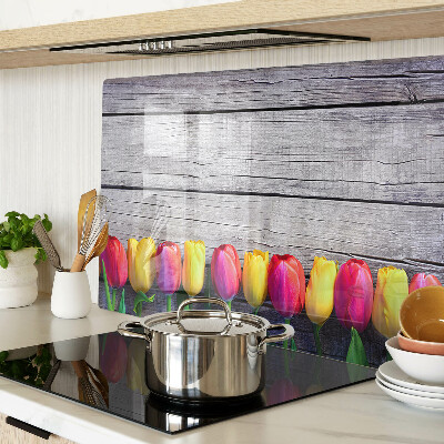 Chopping board Tulips on a wooden background